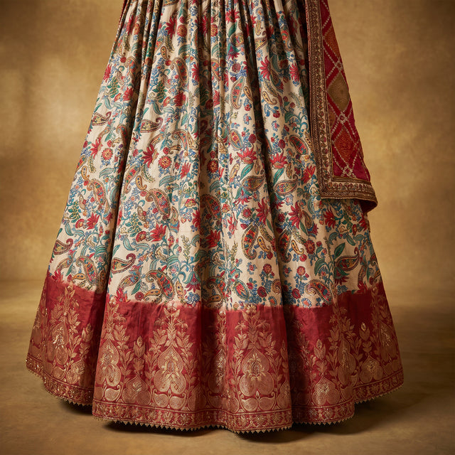 Ivory multicolor paisley lehenga skirt with border and bandhani dupatta edge
