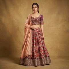 Multicolor floral print lehenga with embroidered dark purple blouse and peach dupatta