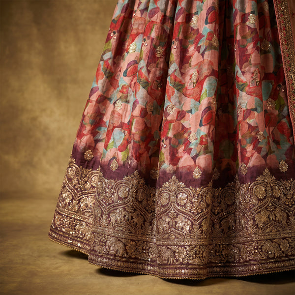 Multicolor floral lehenga skirt with ornate gold embroidered border