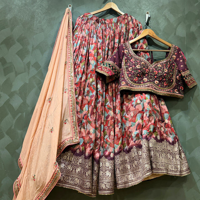 Multicolor floral print lehenga set with dark purple embroidered blouse and gold border