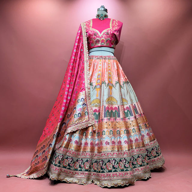 Multicolour lehenga on mannequin with magenta blouse, flared skirt and draped dupatta