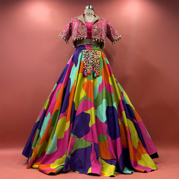 Multicolour printed lehenga with rani pink mirror-work cropped jacket