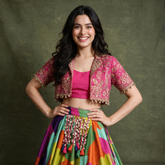 Rani pink printed cropped jacket with mirror trims and multicolour georgette lehenga