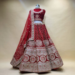 Maroon velvet bridal lehenga with silver embroidered border and double dupatta