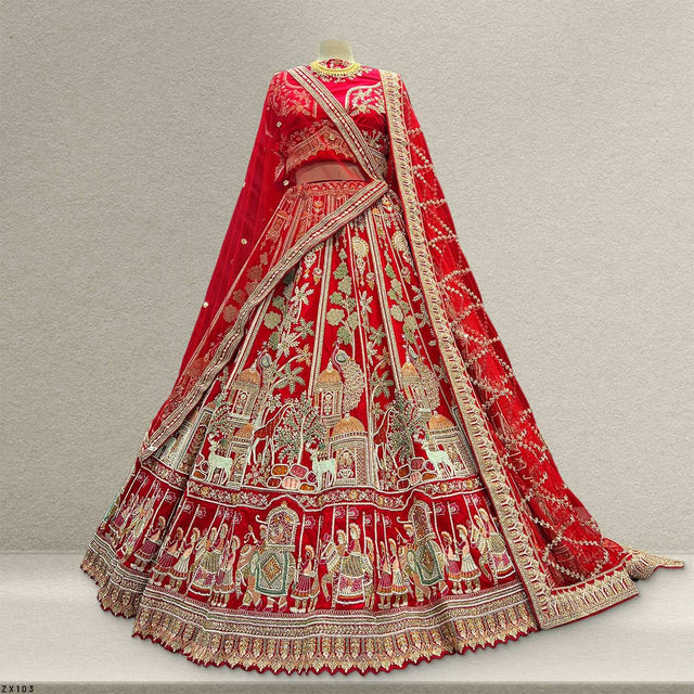 Red bridal lehenga skirt with ornate multicolor border and embellished hem trim
