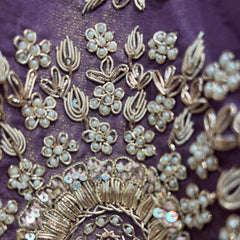 Lavender fabric with silver-gold bead and thread embroidery motif cluster