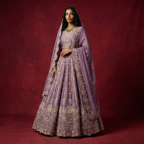 Lavender designer lehenga with gold zardosi embroidery and ornate borders