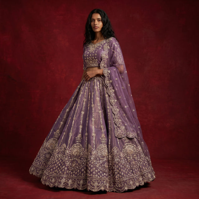 Lavender lehenga skirt with ornate gold border, matching dupatta, full flare