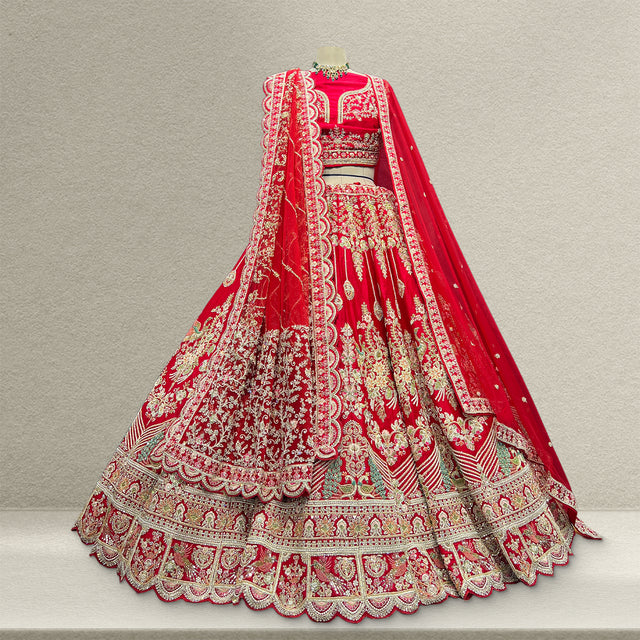 Red embroidered bridal lehenga with wide border hem and matching dupatta drape