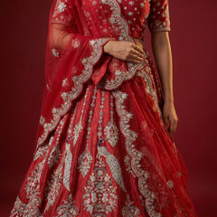Red bridal lehenga skirt with silver zardosi embroidery and ornate border detailing