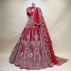 Red designer lehenga with detailed silver embroidery panels and matching dupatta