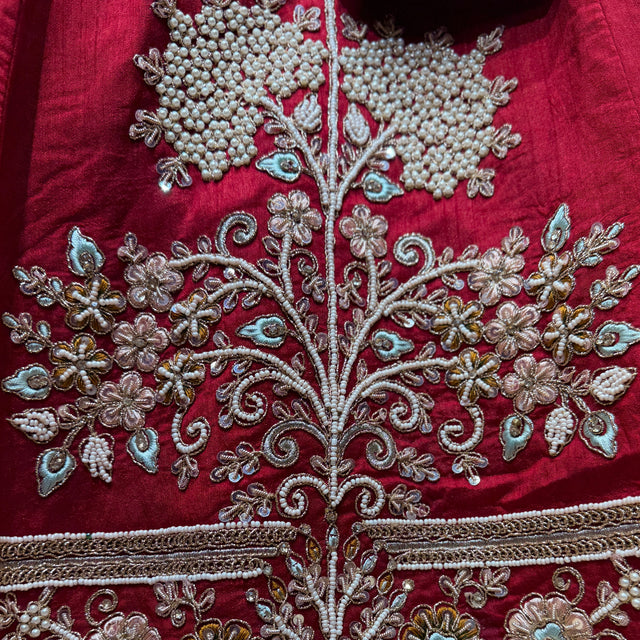 Maroon bridal blouse panel with dense pearl beadwork, floral embroidery and teardrop motifs