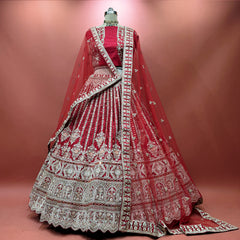 Red bridal lehenga with mirror and pearl handwork, flared skirt and embroidered border