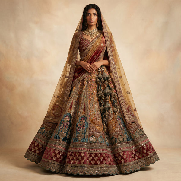 Bridal lehenga with matching dupatta, maroon and teal floral brocade, ornate hem