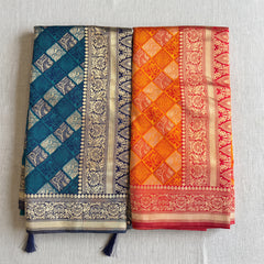 Banarasi art silk bandhni pattern saree with zari paisley checks in teal blue and orange