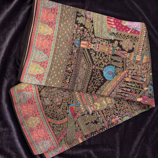 Black dola silk saree folded view with multicolor border and patterned pallu