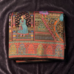 Black dola silk saree with Mughal figures, peacocks and ornate arch border
