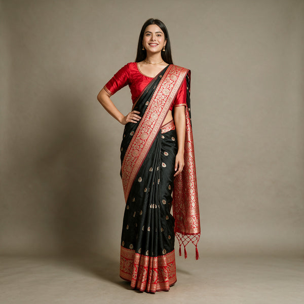 Black Banarasi Art Silk Saree with Zari Butis & Red Floral Border, worn by a model