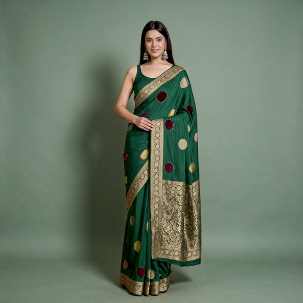 Bottle green silk saree, velvet polka dots, gold zari border, draped front