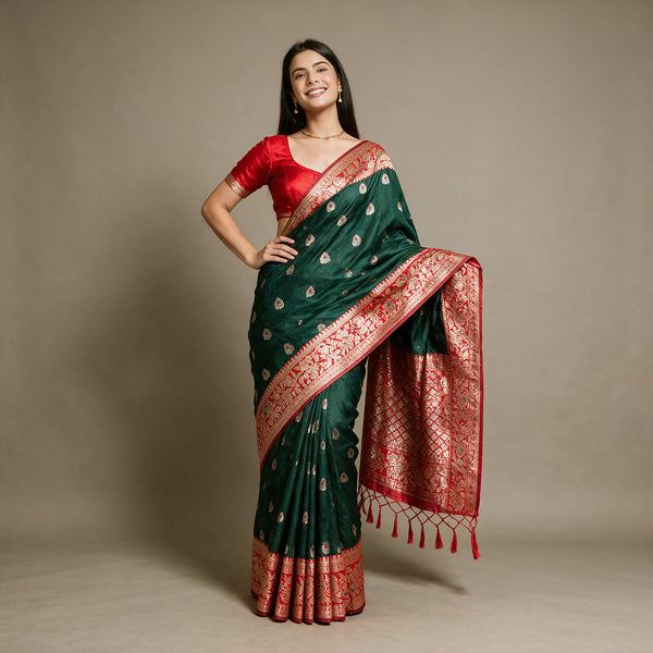 Bottle Green Banarasi Art Silk Saree with Zari Butis & Red Floral Border, worn by a model