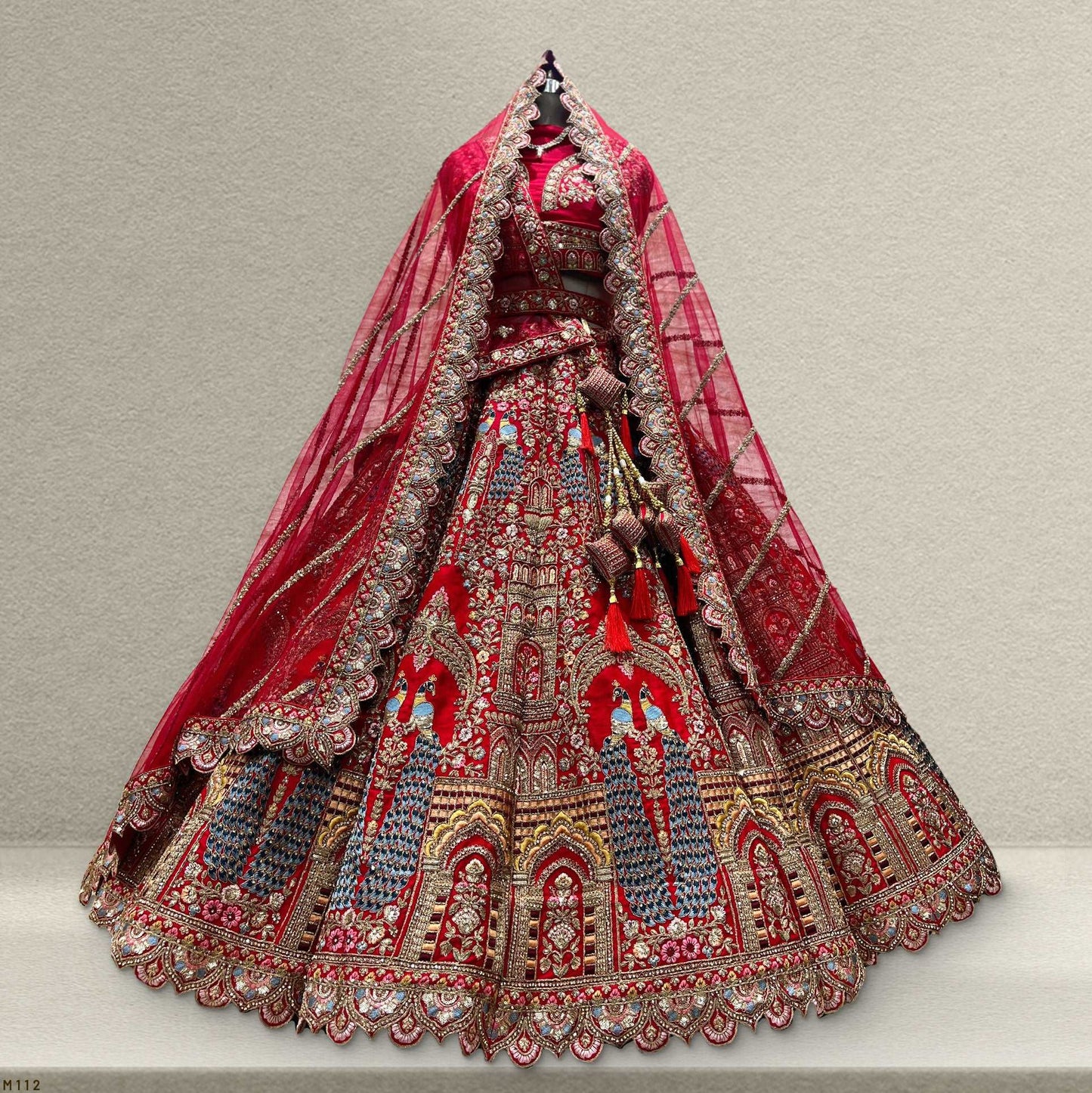 Royal Red Bridal Lehenga with Intricate Embroidery and Elegant Design by JMS Studio