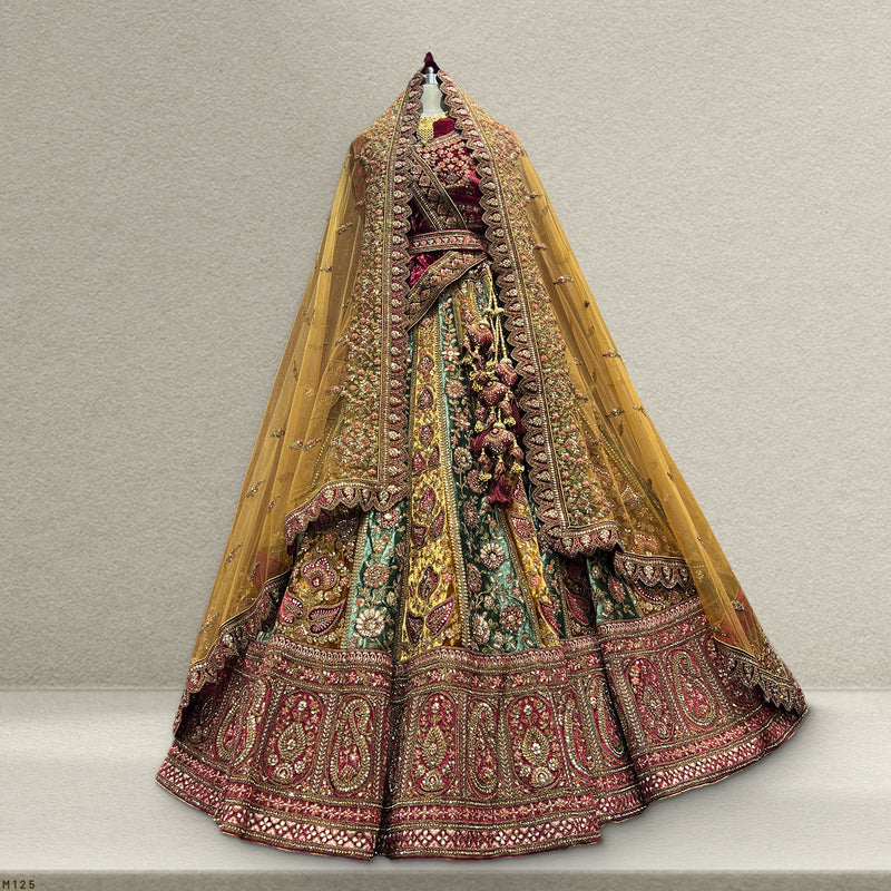 Elegant velvet maroon bridal lehenga from JMS Studio with intricate embroidery and detailed design