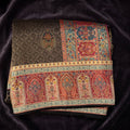 Brown dola silk printed saree with multicolor floral butas and border