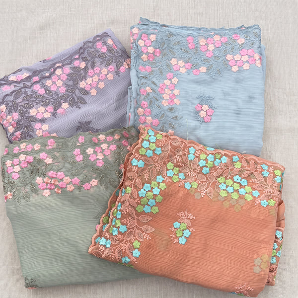Chiffon sarees with floral embroidered cutwork border in four pastel colours
