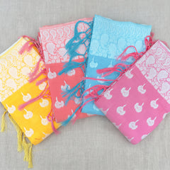 Cotton sarees with white paisley border and tassels in four colours