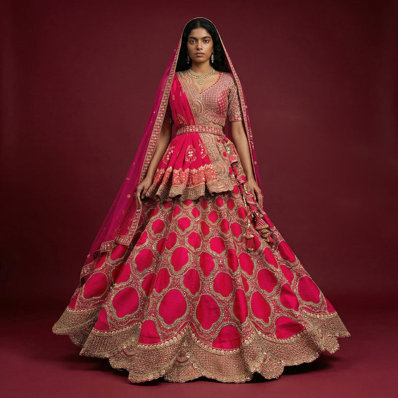 Rani pink bridal lehenga with gold sequin embroidery and embellished double dupatta