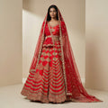 Red bridal lehenga with gold embroidery, flared skirt and double dupatta