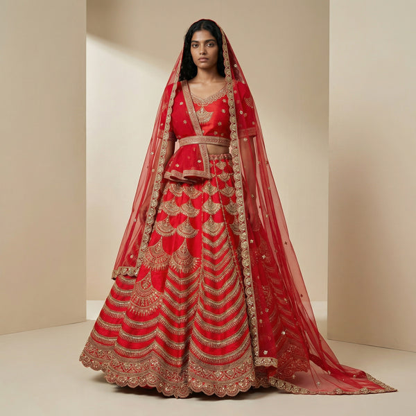 Red bridal lehenga with gold embroidery, flared skirt and double dupatta