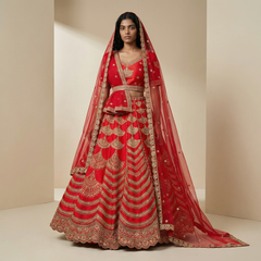 Red bridal lehenga with scalloped gold embroidery and double sheer dupatta