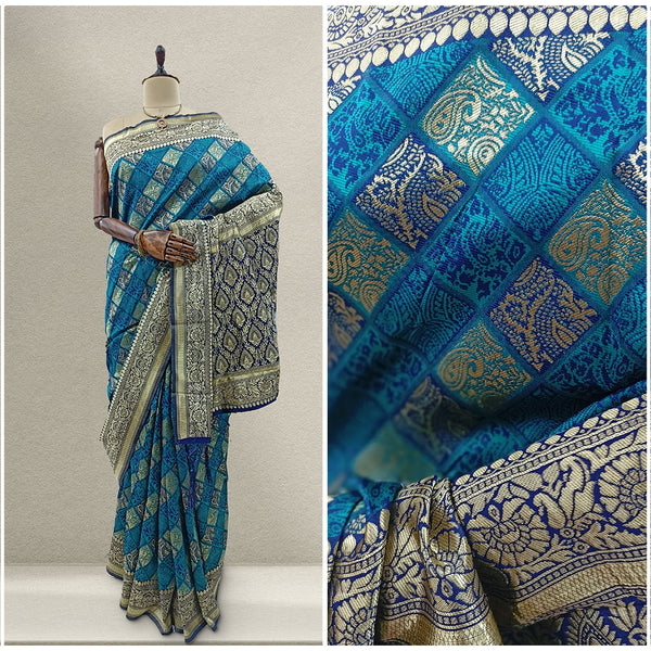 Royal blue silk saree with geometric bandhej pattern and silver-toned border