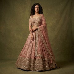 Mauve tissue silk lehenga with gold sequin embroidery and matching sheer dupatta