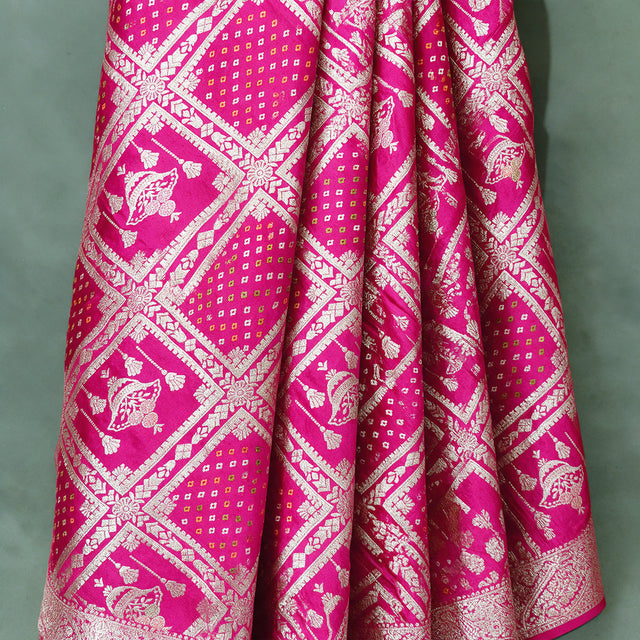 Rani pink gharchola satin saree, close-up of the zari check weave