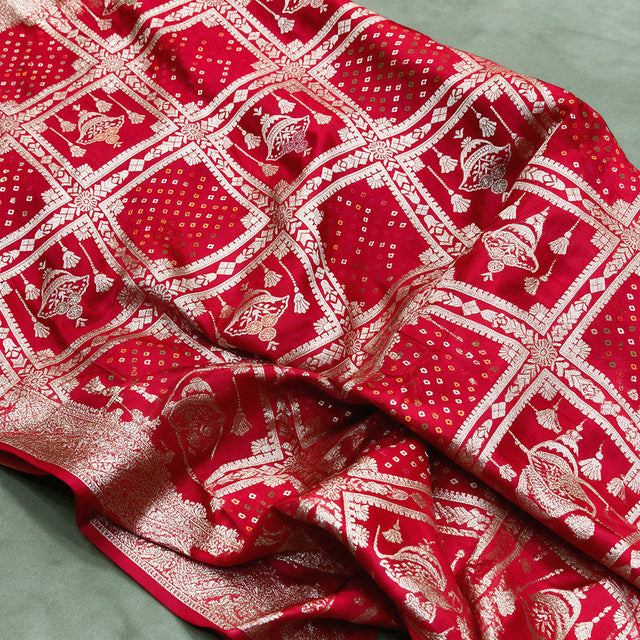 Red gharchola satin saree, close-up of the zari check weave