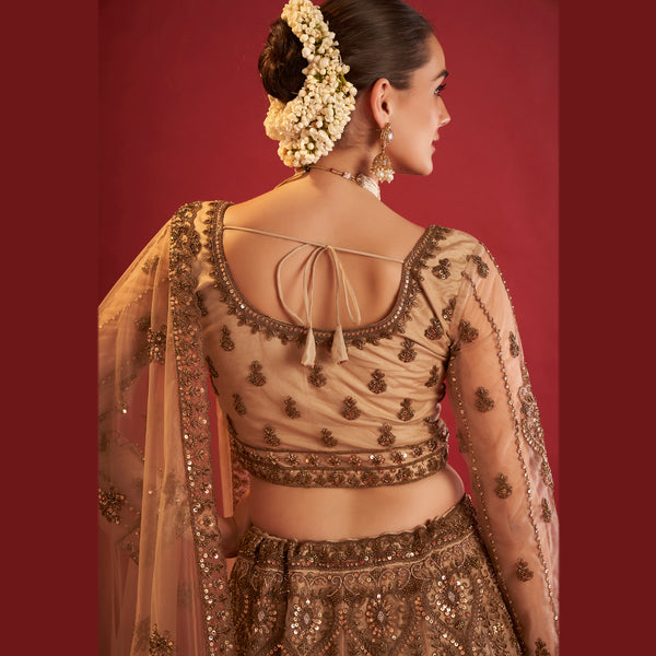 Stylish golden lehenga with beads, featuring intricate embroidery and a matching dupatta