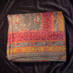 Grey position print saree in pure viscose, folded view