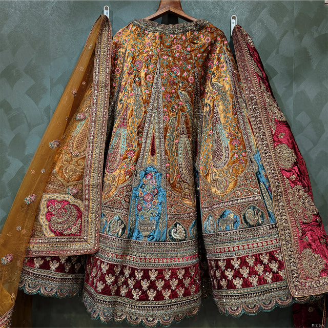 Multicolor bridal lehenga with pleated skirt, gold embroidery, and matching sheer dupatta