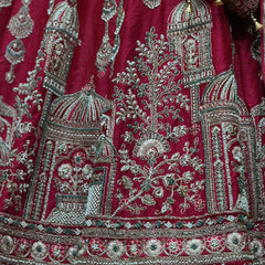 Rani pink raw silk bridal lehenga with ornate Jharoka motif embroidery and border