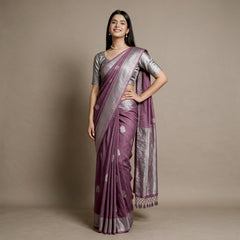 Mauve linen-cotton saree with silver zari border and scattered floral butas