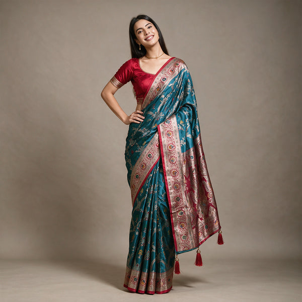Satin Gifting Saree with Meenakari Arch Jaal & Contrast Border in teal with a red border, worn by a model
