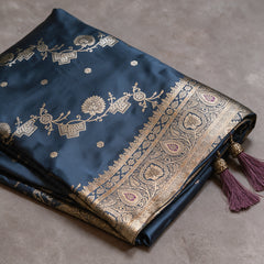 Satin Gifting Saree with Zari Floral Vine & Paisley Border in navy with a purple edge, folded