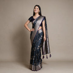 Satin Gifting Saree with Zari Floral Vine & Paisley Border in navy with a purple edge, worn by a model
