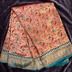 Peach position print saree in pure viscose, opened out to show the border and pallu