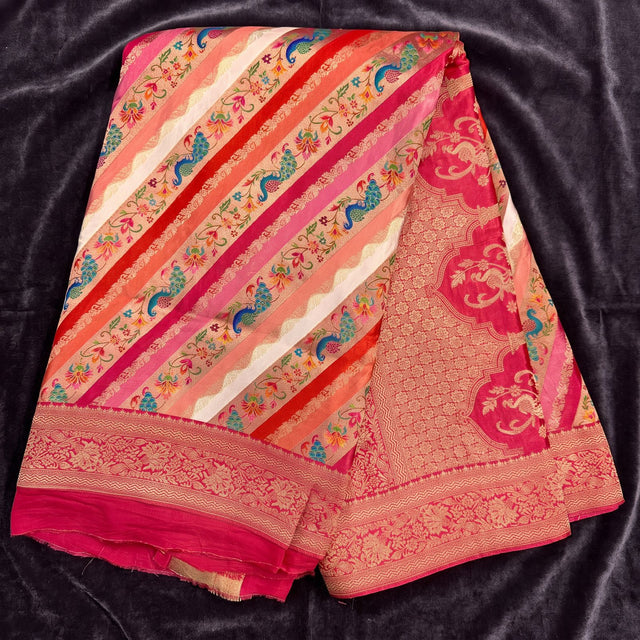 Red position print saree in pure viscose, opened out to show the border and pallu