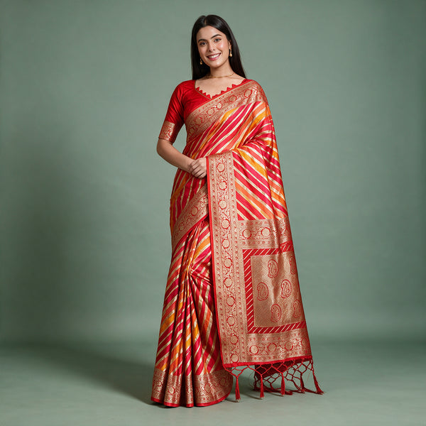 Red and orange silk saree with gold paisley border and pallu, draped on model