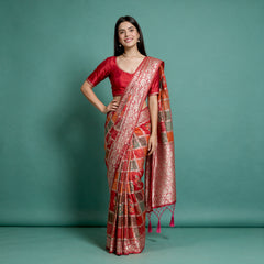 Red Banarasi-style silk saree with zari floral border and patchwork motifs