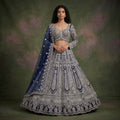 Navy blue designer lehenga with silver-toned embroidered skirt and matching dupatta